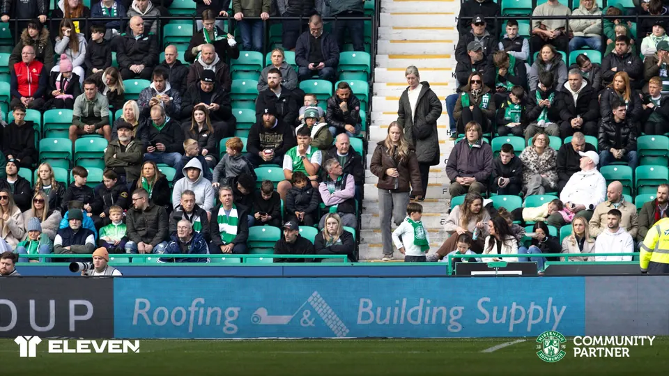 Roofing & Building Supply pitchside board at a Hibernian match, as a Hibs Community Partner